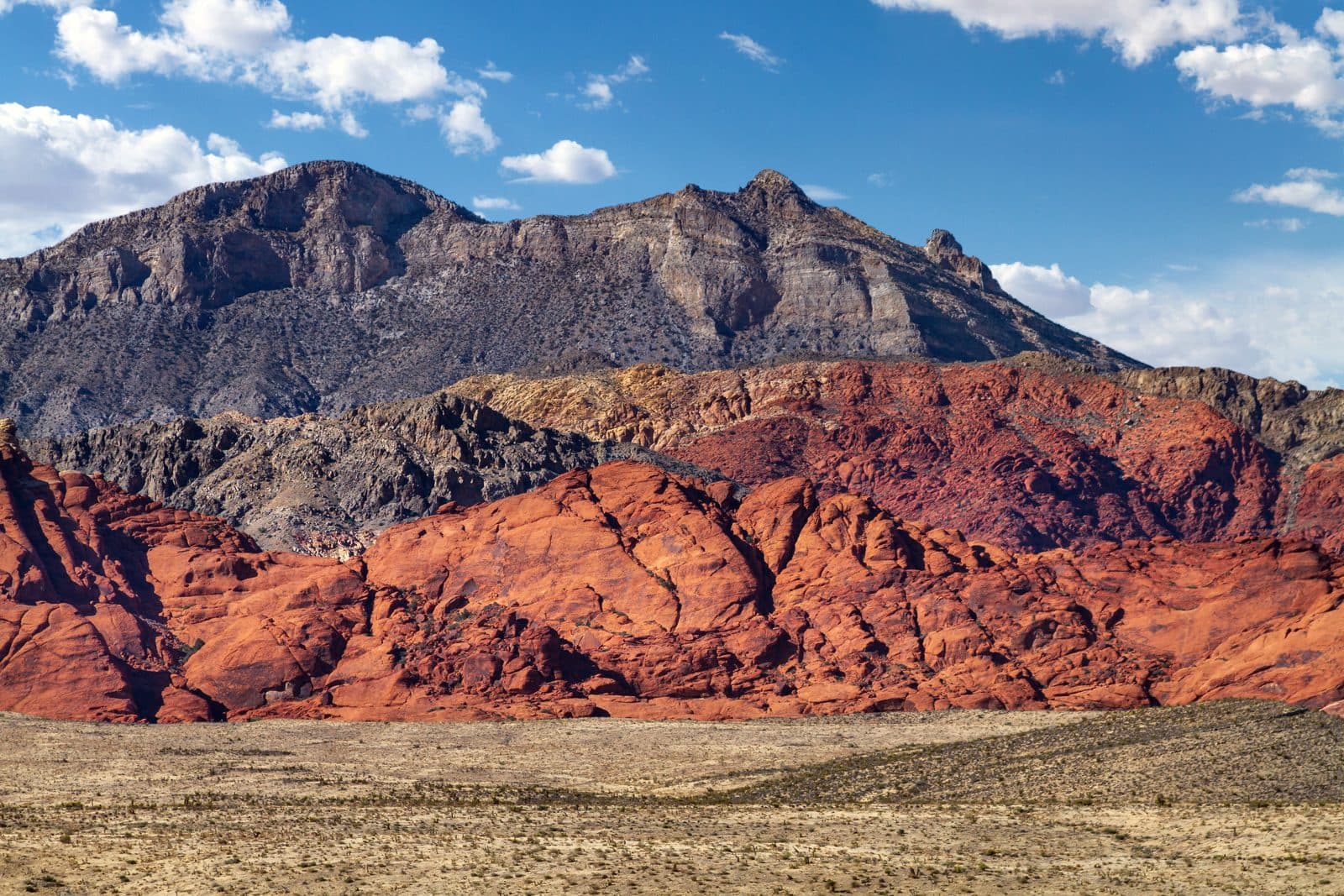 The red sandstone escarpment and gray limestone peaks of Red Rock Canyon National Conservation Area outside Las Vegas, NV